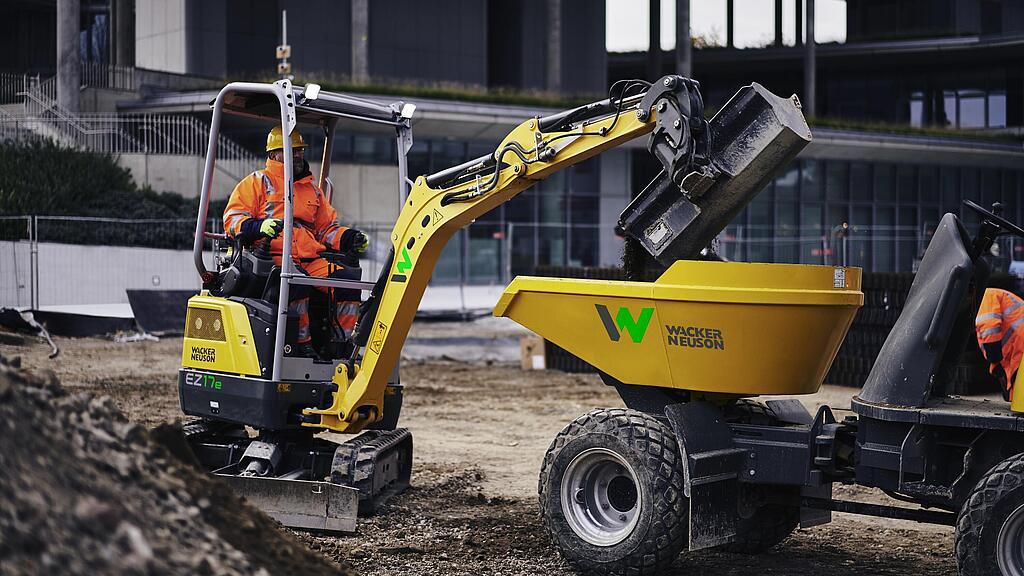 The zero emission electric mini-excavator EZ17e in application on a construction site.